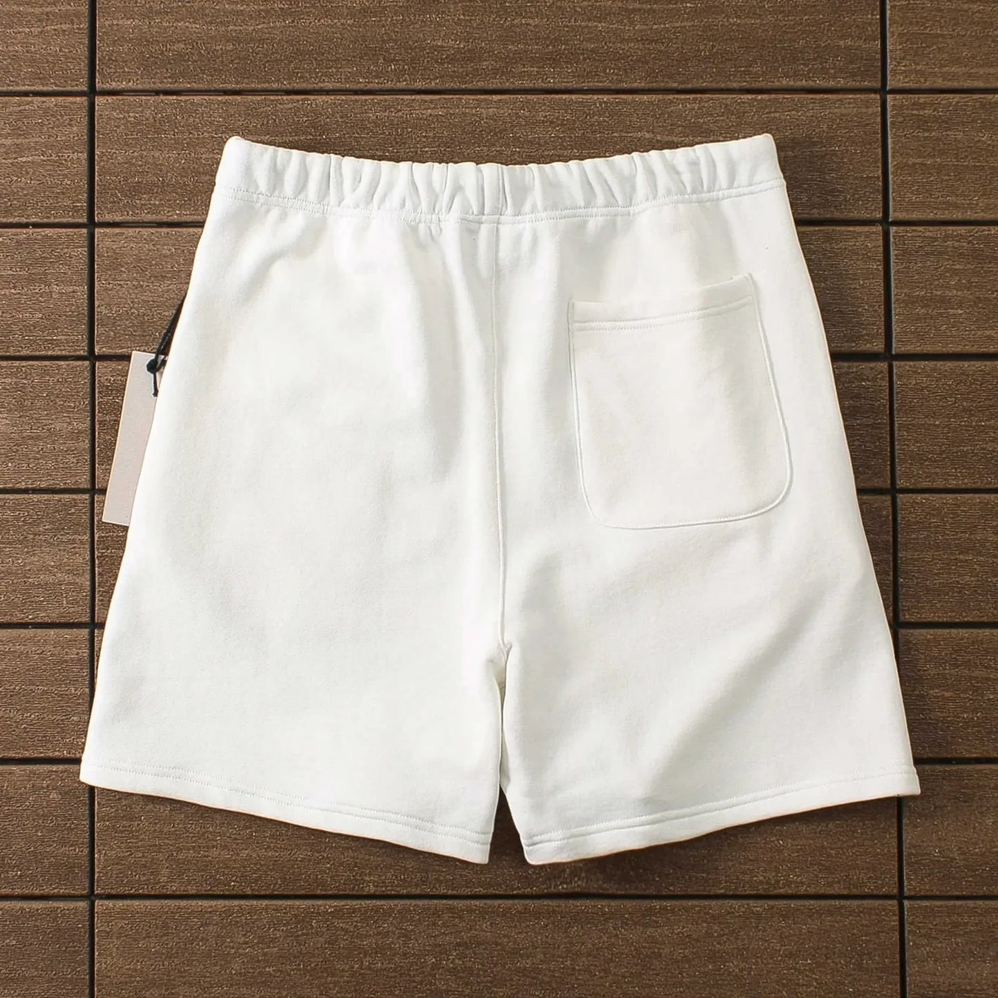 "essence" shorts white